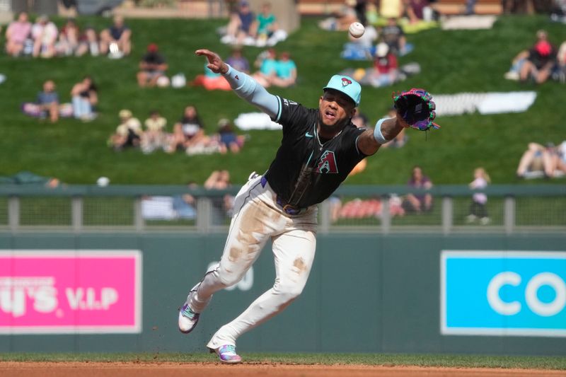 Feb 27, 2024; Salt River Pima-Maricopa, Arizona, USA; Arizona Diamondbacks second baseman Ketel Marte (4) dives for the ball against the Texas Rangers during the third inning at Salt River Fields at Talking Stick. Mandatory Credit: Rick Scuteri-USA TODAY Sports