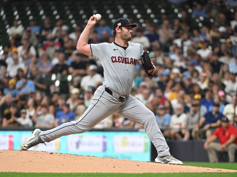 Aug 16, 2024; Milwaukee, Wisconsin, USA; Cleveland Guardians pitcher Gavin Williams (32) delivers a pitch against the Milwaukee Brewers in the first inning  at American Family Field. Mandatory Credit: Michael McLoone-USA TODAY Sports