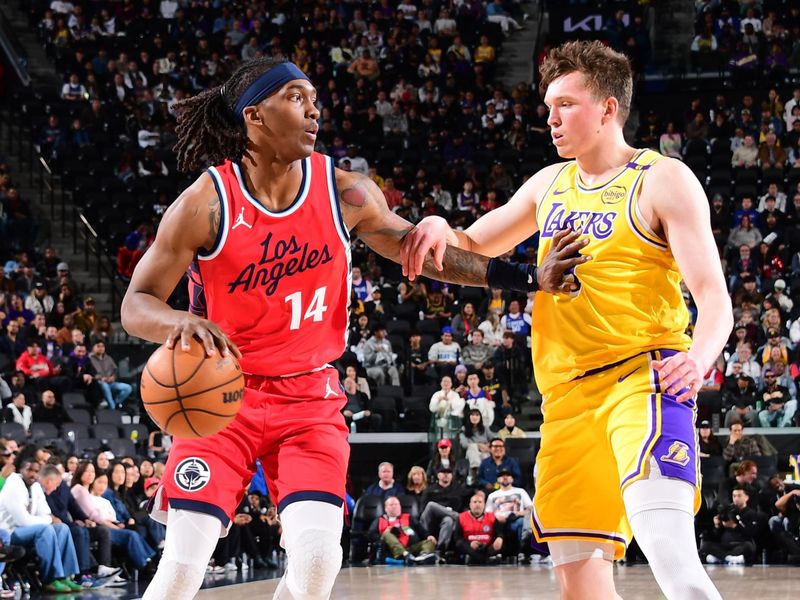 INGLEWOOD, CA - FEBRUARY 4: Terance Mann #14 of the LA Clippers dribbles the ball during the game against the Los Angeles Lakers on February 4, 2025 at Intuit Dome in Los Angeles, California. NOTE TO USER: User expressly acknowledges and agrees that, by downloading and/or using this Photograph, user is consenting to the terms and conditions of the Getty Images License Agreement. Mandatory Copyright Notice: Copyright 2025 NBAE (Photo by Adam Pantozzi/NBAE via Getty Images)