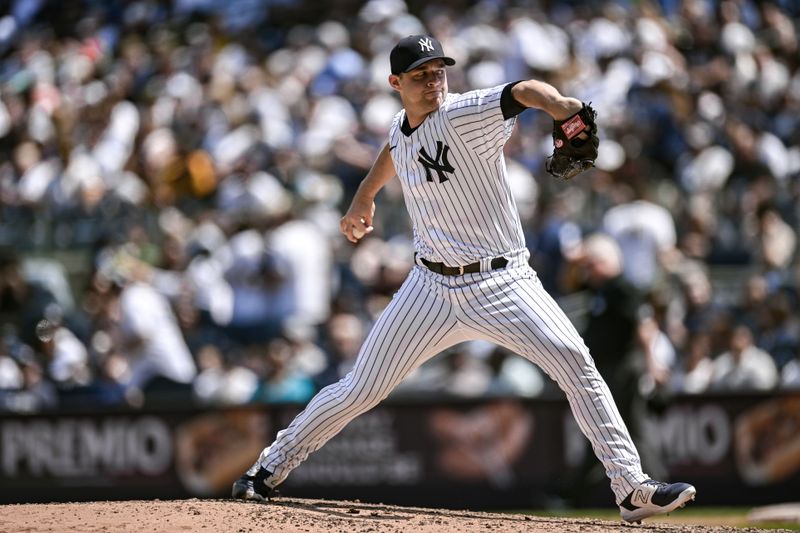 May 27, 2023; Bronx, New York, USA; New York Yankees relief pitcher Michael King (34) pitches against the San Diego Padres during the seventh inning at Yankee Stadium. Mandatory Credit: John Jones-USA TODAY Sports