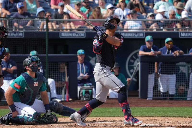 Feb 26, 2026; Peoria, Arizona, USA; Cleveland Guardians shortstop Juan Brito (74) bats against the Seattle Mariners in the second inning at Peoria Sports Complex. Mandatory Credit: Rick Scuteri-Imagn Images