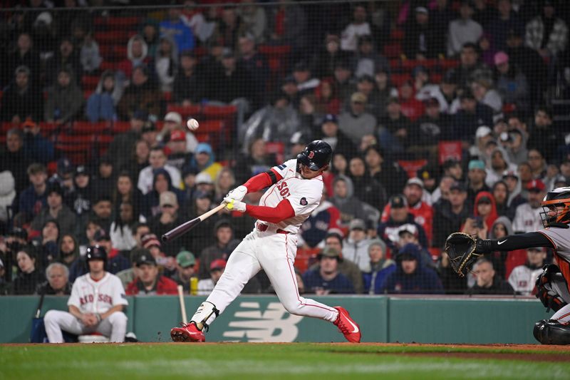 Apr 11, 20024; Boston, Massachusetts, USA; Boston Red Sox center fielder Jarren Duran (16) hits a single against the Baltimore Orioles during the seventh inning at Fenway Park. Mandatory Credit: Eric Canha-USA TODAY Sports