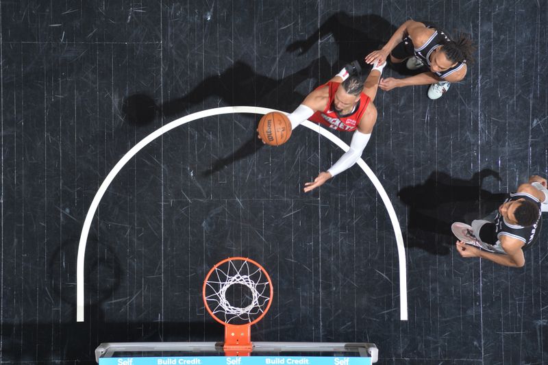 SAN ANTONIO, TX - MARCH 12: Dillon Brooks #9 of the Houston Rockets shoots the ball during the game against the San Antonio Spurs on March 12, 2024 at the Frost Bank Center in San Antonio, Texas. NOTE TO USER: User expressly acknowledges and agrees that, by downloading and or using this photograph, user is consenting to the terms and conditions of the Getty Images License Agreement. Mandatory Copyright Notice: Copyright 2024 NBAE (Photos by Michael Gonzales/NBAE via Getty Images)