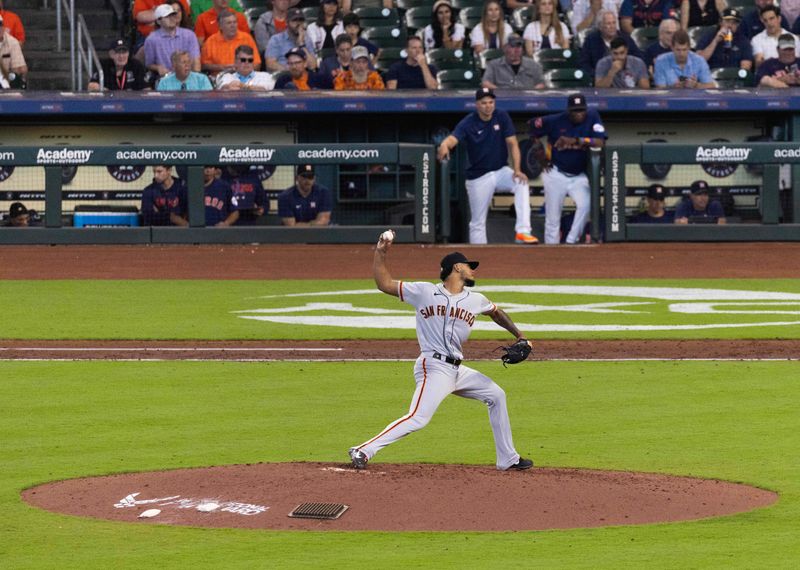 May 3, 2023; Houston, Texas, USA; San Francisco Giants relief pitcher Camilo Doval (75) throws against the Houston Astros in the ninth inning at Minute Maid Park. Mandatory Credit: Thomas Shea-USA TODAY Sports