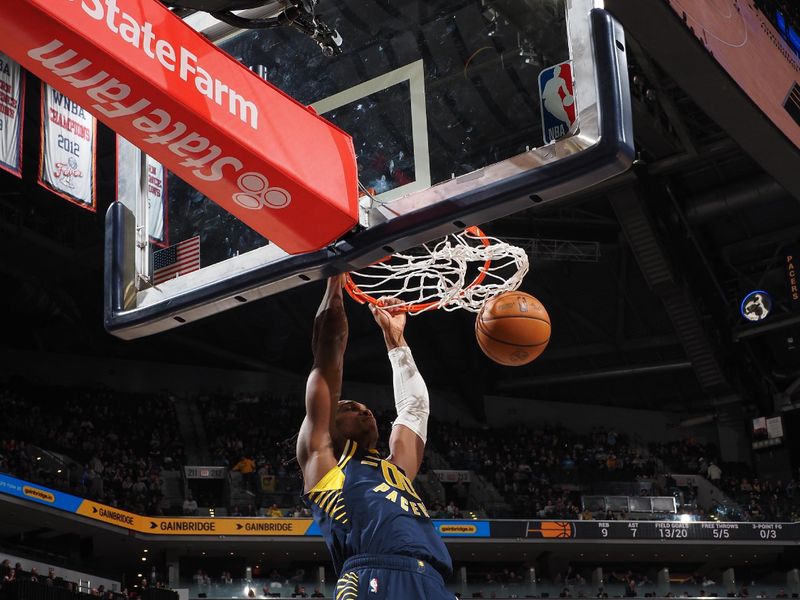 INDIANAPOLIS, IN - JANUARY 23: Bennedict Mathurin #00 of the Indiana Pacers dunks the ball during the game against the Denver Nuggets on January 23, 2024 at Gainbridge Fieldhouse in Indianapolis, Indiana. NOTE TO USER: User expressly acknowledges and agrees that, by downloading and or using this Photograph, user is consenting to the terms and conditions of the Getty Images License Agreement. Mandatory Copyright Notice: Copyright 2024 NBAE (Photo by Ron Hoskins/NBAE via Getty Images)