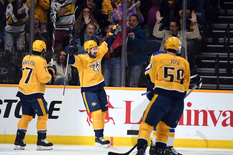 Apr 4, 2024; Nashville, Tennessee, USA; Nashville Predators left wing Filip Forsberg (9) celebrates after a goal during the second period against the St. Louis Blues at Bridgestone Arena. Mandatory Credit: Christopher Hanewinckel-USA TODAY Sports