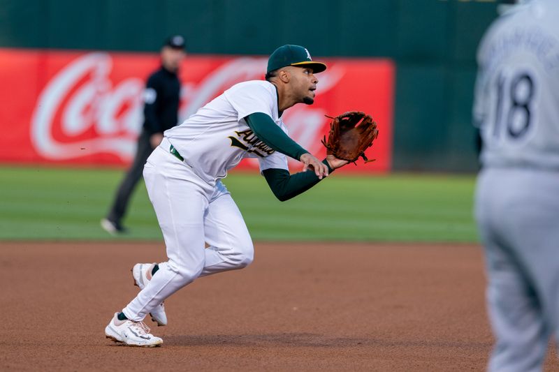 Aug 5, 2024; Oakland, California, USA;  Oakland Athletics third baseman Darell Hernaiz (2) fields a ground ball Chicago White Sox during the fourth inning at Oakland-Alameda County Coliseum. Mandatory Credit: Neville E. Guard-USA TODAY Sports