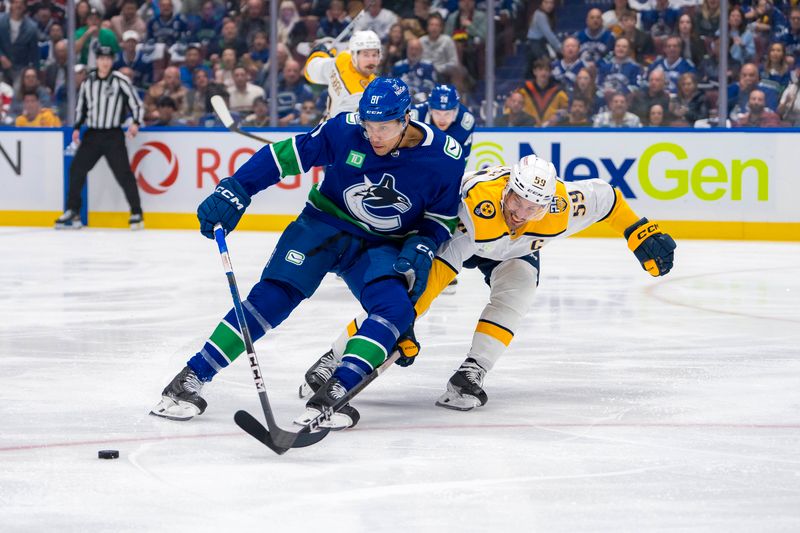 Apr 21, 2024; Vancouver, British Columbia, CAN; Nashville Predators defenseman Roman Josi (59) stick checks Vancouver Canucks forward Dakota Joshua (81) in the first period in game one of the first round of the 2024 Stanley Cup Playoffs at Rogers Arena. Mandatory Credit: Bob Frid-USA TODAY Sports