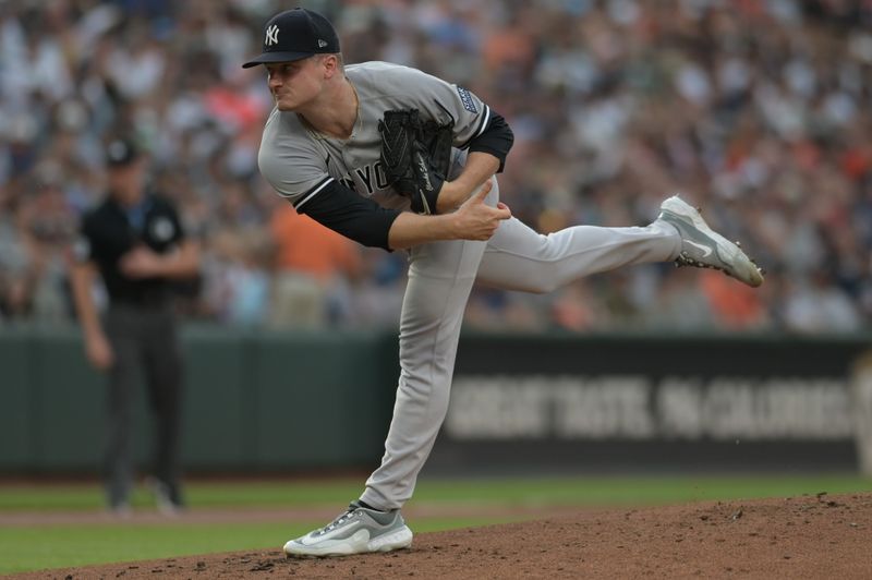 Jul 29, 2023; Baltimore, Maryland, USA;  New York Yankees starting pitcher Clarke Schmidt (36) delivers a first inning pitch against the Baltimore Orioles at Oriole Park at Camden Yards. Mandatory Credit: Tommy Gilligan-USA TODAY Sports