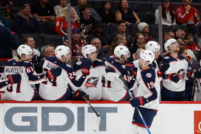 Sep 27, 2024; Washington, District of Columbia, USA; Columbus Blue Jackets center Adam Fantilli (19) celebrates with teammates after scoring a goal against the Washington Capitals in the first period at Capital One Arena. Mandatory Credit: Geoff Burke-Imagn Images