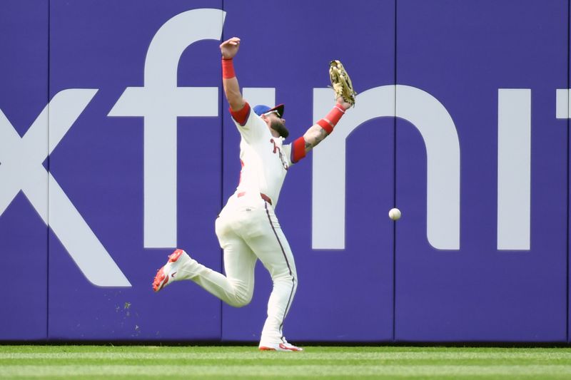 Jun 1, 2025; Philadelphia, Pennsylvania, USA; Philadelphia Phillies outfielder Weston Wilson (37) can't make catch in left field on double hit by Milwaukee Brewers third base Caleb Durbin (21) (not pictured) during the seventh inning at Citizens Bank Park. Mandatory Credit: Eric Hartline-Imagn Images