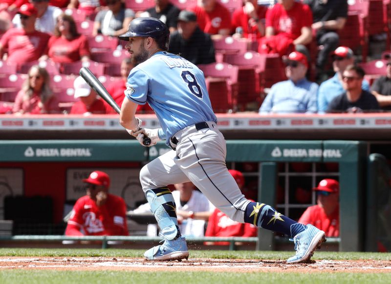 Apr 19, 2023; Cincinnati, Ohio, USA; Tampa Bay Rays second baseman Brandon Lowe (8) hits a single against the Cincinnati Reds during the first inning at Great American Ball Park. Mandatory Credit: David Kohl-USA TODAY Sports