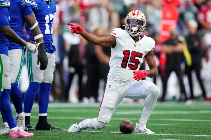 San Francisco 49ers wide receiver Jauan Jennings (15) reacts after a catch during the first half of an NFL football game against the Seattle Seahawks, Thursday, Oct. 10, 2024, in Seattle. (AP Photo/Lindsey Wasson)