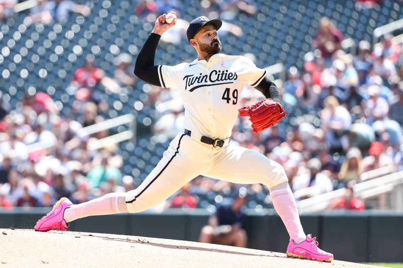 May 11, 2025; Minneapolis, Minnesota, USA; Minnesota Twins starting pitcher Pablo Lopez (49) delivers a pitch against the San Francisco Giants during the first inning at Target Field. Mandatory Credit: Matt Krohn-Imagn Images
