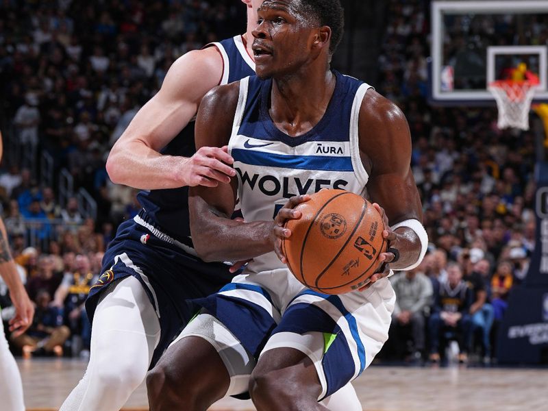 DENVER, CO - APRIL 10: Anthony Edwards #5 of the Minnesota Timberwolves handles the ball during the game against the Denver Nuggets on April 10, 2024 at the Ball Arena in Denver, Colorado. NOTE TO USER: User expressly acknowledges and agrees that, by downloading and/or using this Photograph, user is consenting to the terms and conditions of the Getty Images License Agreement. Mandatory Copyright Notice: Copyright 2024 NBAE (Photo by Garrett Ellwood/NBAE via Getty Images)