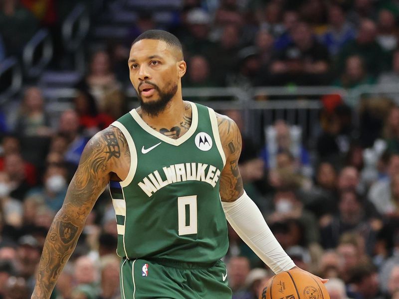 MILWAUKEE, WISCONSIN - DECEMBER 21: Damian Lillard #0 of the Milwaukee Bucks handles the ball during a game against the Orlando Magic at Fiserv Forum on December 21, 2023 in Milwaukee, Wisconsin. NOTE TO USER: User expressly acknowledges and agrees that, by downloading and or using this photograph, User is consenting to the terms and conditions of the Getty Images License Agreement. (Photo by Stacy Revere/Getty Images)