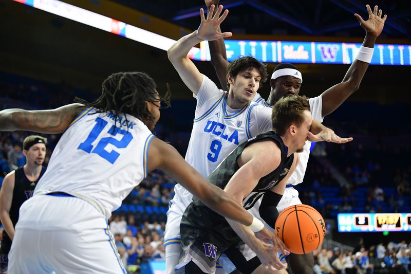 January 14, 2024; Los Angeles, California, USA; UCLA Bruins forward Berke Buyuktuncel (9) and guard Sebastian Mack (12) play for the ball against Washington Huskies forward Moses Wood (13) during the first half at Pauley Pavilion. Mandatory Credit: Gary A. Vasquez-USA TODAY Sports