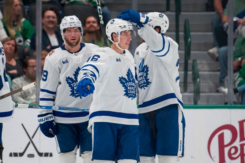 Oct 26, 2023; Dallas, Texas, USA; Toronto Maple Leafs right wing Mitchell Marner (16) and center Calle Jarnkrok (19) and defenseman TJ Brodie (78) celebrates a goal scored by Marner against the Dallas Stars during the second period at the American Airlines Center. Mandatory Credit: Jerome Miron-USA TODAY Sports