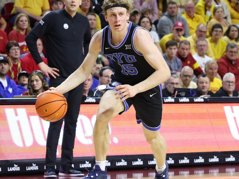 Mar 6, 2024; Ames, Iowa, USA; Brigham Young Cougars guard Richie Saunders (15) sets the offense against Iowa State Cyclones in the second half at James H. Hilton Coliseum. Mandatory Credit: Reese Strickland-USA TODAY Sports