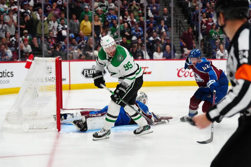 May 17, 2024; Denver, Colorado, USA; Dallas Stars center Matt Duchene (95) skates past Colorado Avalanche goaltender Alexandar Georgiev (40) and defenseman Josh Manson (42) during double overtime period in game six of the second round of the 2024 Stanley Cup Playoffs at Ball Arena. Mandatory Credit: Ron Chenoy-USA TODAY Sports