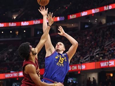 CLEVELAND, OH - NOVEMBER 19: Nikola Jokic #15 of the Denver Nuggets shoots the ball during the game against the Cleveland Cavaliers on November 19, 2023 at Rocket Mortgage FieldHouse in Cleveland, Ohio. NOTE TO USER: User expressly acknowledges and agrees that, by downloading and/or using this Photograph, user is consenting to the terms and conditions of the Getty Images License Agreement. Mandatory Copyright Notice: Copyright 2023 NBAE (Photo by Lauren Leigh Bacho/NBAE via Getty Images)