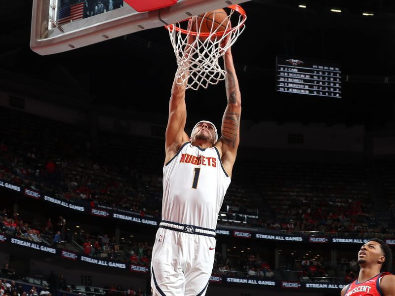 NEW ORLEANS, LA - NOVEMBER 15: Michael Porter Jr. #1 of the Denver Nuggets dunks the ball during the game against the New Orleans Pelicans during the Emirates NBA Cup game on November 15, 2024 at the Smoothie King Center in New Orleans, Louisiana. NOTE TO USER: User expressly acknowledges and agrees that, by downloading and or using this Photograph, user is consenting to the terms and conditions of the Getty Images License Agreement. Mandatory Copyright Notice: Copyright 2024 NBAE (Photo by Layne Murdoch Jr./NBAE via Getty Images)