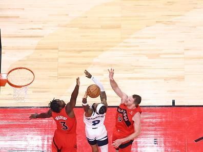 TORONTO, CANADA - OCTOBER 25: Nickeil Alexander-Walker #9 of the Minnesota Timberwolves drives to the basket during the game against the Toronto Raptors on October 25, 2023 at the Scotiabank Arena in Toronto, Ontario, Canada.  NOTE TO USER: User expressly acknowledges and agrees that, by downloading and or using this Photograph, user is consenting to the terms and conditions of the Getty Images License Agreement.  Mandatory Copyright Notice: Copyright 2023 NBAE (Photo by Vaughn Ridley/NBAE via Getty Images)