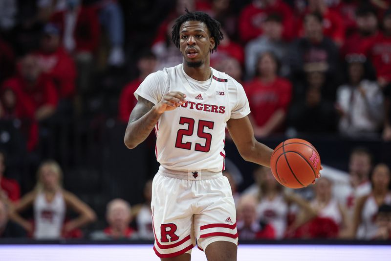 Feb 10, 2024; Piscataway, New Jersey, USA; Rutgers Scarlet Knights guard Jeremiah Williams (25) dribbles the ball up court against the Wisconsin Badgers during the second half at Jersey Mike's Arena. Mandatory Credit: Vincent Carchietta-USA TODAY Sports