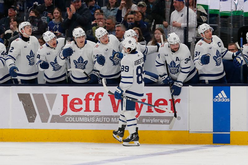 Dec 29, 2023; Columbus, Ohio, USA; Toronto Maple Leafs left wing Nicholas Robertson (89) celebrates his goal against the Columbus Blue Jackets during the second period at Nationwide Arena. Mandatory Credit: Russell LaBounty-USA TODAY Sports