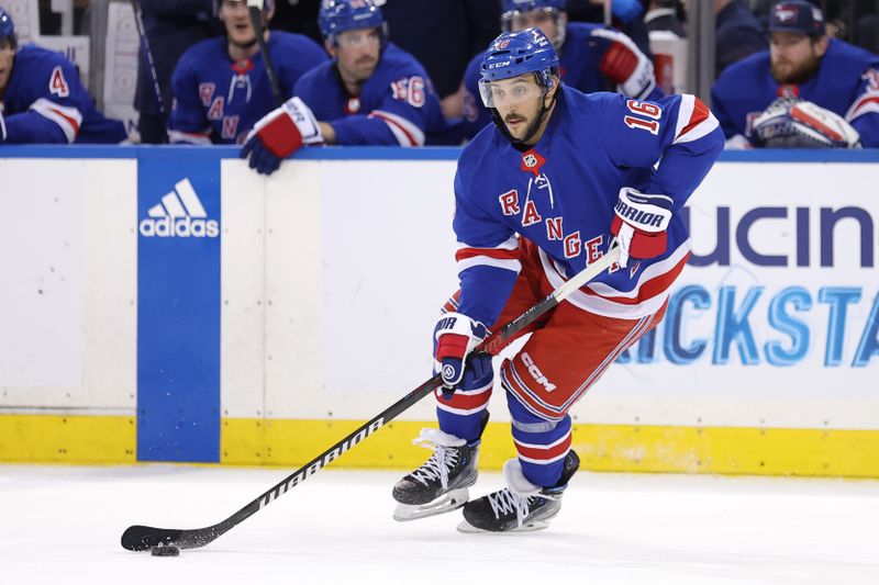 Feb 20, 2024; New York, New York, USA; New York Rangers center Vincent Trocheck (16) controls the puck against the Dallas Stars during the third period at Madison Square Garden. Mandatory Credit: Brad Penner-USA TODAY Sports