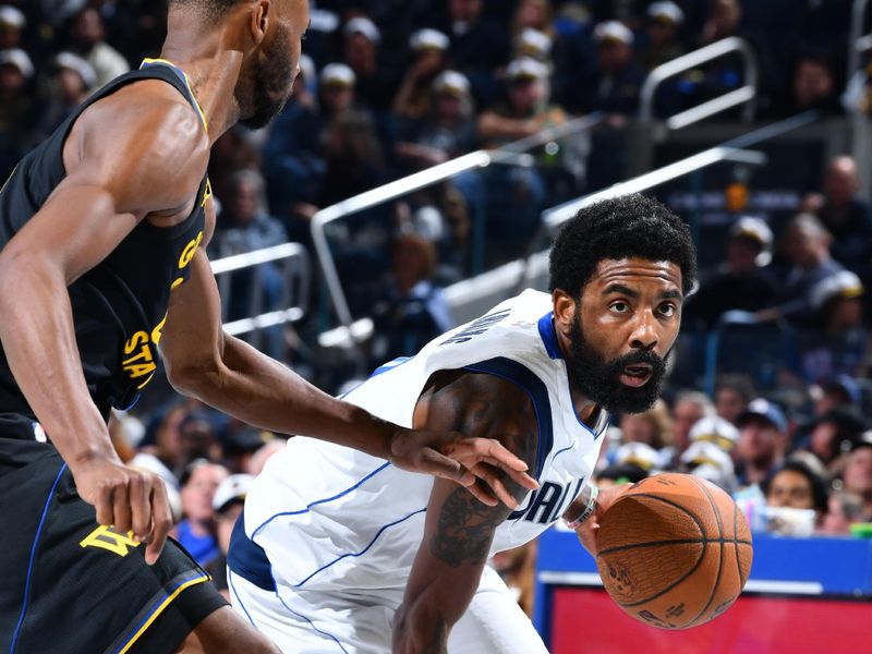 PHOENIX, AZ - NOVEMBER 12: Kyrie Irving #11 of the Dallas Mavericks handles the ball during the game against the Golden State Warriors during the Emirates NBA Cup game on November 12, 2024 at Footprint Center in Phoenix, Arizona. NOTE TO USER: User expressly acknowledges and agrees that, by downloading and or using this photograph, user is consenting to the terms and conditions of the Getty Images License Agreement. Mandatory Copyright Notice: Copyright 2024 NBAE (Photo by Barry Gossage/NBAE via Getty Images)