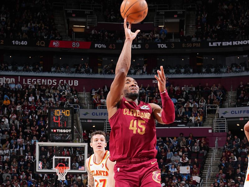 CLEVELAND, OH - JANUARY 30:  Donovan Mitchell #45 of the Cleveland Cavaliers shoots the ball during the game on January 30, 2025 at Rocket Mortgage FieldHouse in Cleveland, Ohio. NOTE TO USER: User expressly acknowledges and agrees that, by downloading and/or using this Photograph, user is consenting to the terms and conditions of the Getty Images License Agreement. Mandatory Copyright Notice: Copyright 2025 NBAE (Photo by Garrett Ellwood/NBAE via Getty Images)