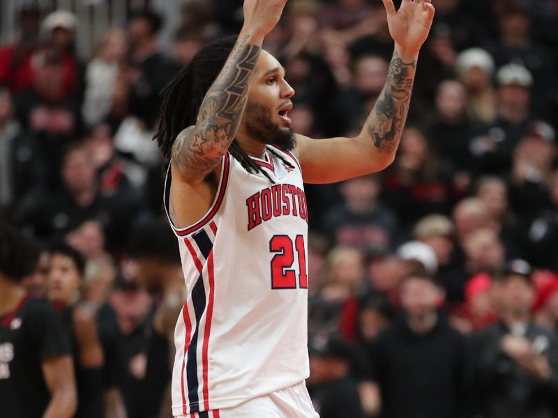 Jan 24, 2026; Lubbock, Texas, USA;  Houston Cougars guard Emanuel Sharp (21) reacts to a foul call in the second half of the game against the Houston Cougars at United Supermarkets Arena. Mandatory Credit: Michael C. Johnson-Imagn Images