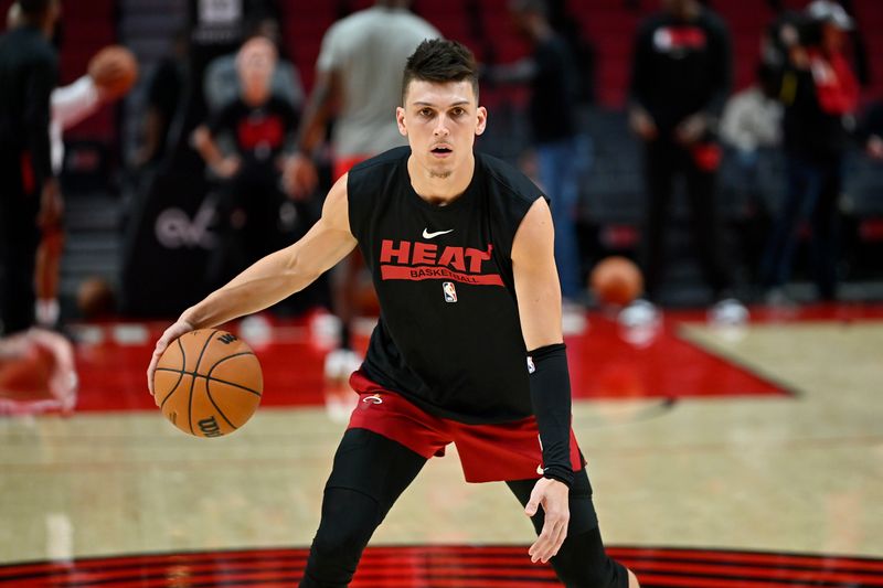 PORTLAND, OREGON - OCTOBER 26: Tyler Herro #14 of the Miami Heat warms up before the game against the Portland Trail Blazers at the Moda Center on October 26, 2022 in Portland, Oregon. NOTE TO USER: User expressly acknowledges and agrees that, by downloading and or using this photograph, User is consenting to the terms and conditions of the Getty Images License Agreement. (Photo by Alika Jenner/Getty Images)