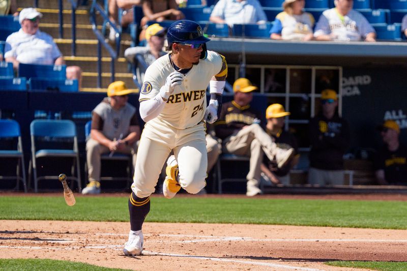 Mar 1, 2024; Phoenix, Arizona, USA;  Milwaukee Brewers catcher William Contreras (24) with a single in the third during a spring training game against the San Diego Padres at American Family Fields of Phoenix. Mandatory Credit: Allan Henry-USA TODAY Sports