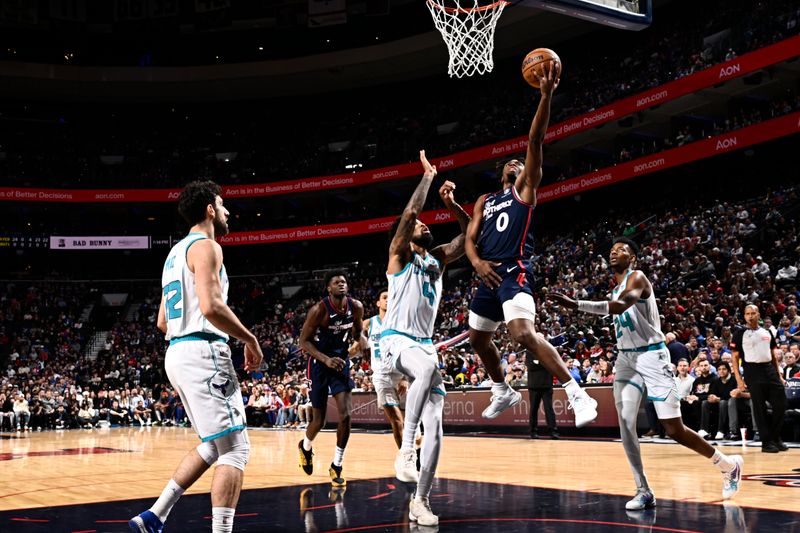 PHILADELPHIA, PA - MARCH 16: Tyrese Maxey #0 of the Philadelphia 76ers drives to the basket during the game against the Charlotte Hornets on March 16, 2024 at the Wells Fargo Center in Philadelphia, Pennsylvania NOTE TO USER: User expressly acknowledges and agrees that, by downloading and/or using this Photograph, user is consenting to the terms and conditions of the Getty Images License Agreement. Mandatory Copyright Notice: Copyright 2024 NBAE (Photo by David Dow/NBAE via Getty Images)