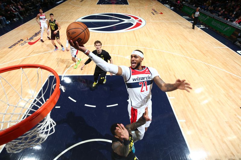 WASHINGTON, DC -? JANUARY 25: Daniel Gafford #21 of the Washington Wizards drives to the basket during the game  against the Utah Jazz on January 25, 2024 at Capital One Arena in Washington, DC. NOTE TO USER: User expressly acknowledges and agrees that, by downloading and or using this Photograph, user is consenting to the terms and conditions of the Getty Images License Agreement. Mandatory Copyright Notice: Copyright 2024 NBAE (Photo by Stephen Gosling/NBAE via Getty Images)