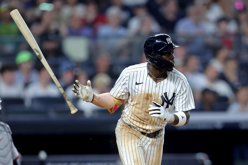 Jun 5, 2025; Bronx, New York, USA; New York Yankees third baseman Jazz Chisholm Jr. (13) watches his RBI single against the Cleveland Guardians during the seventh inning at Yankee Stadium. Mandatory Credit: Brad Penner-Imagn Images