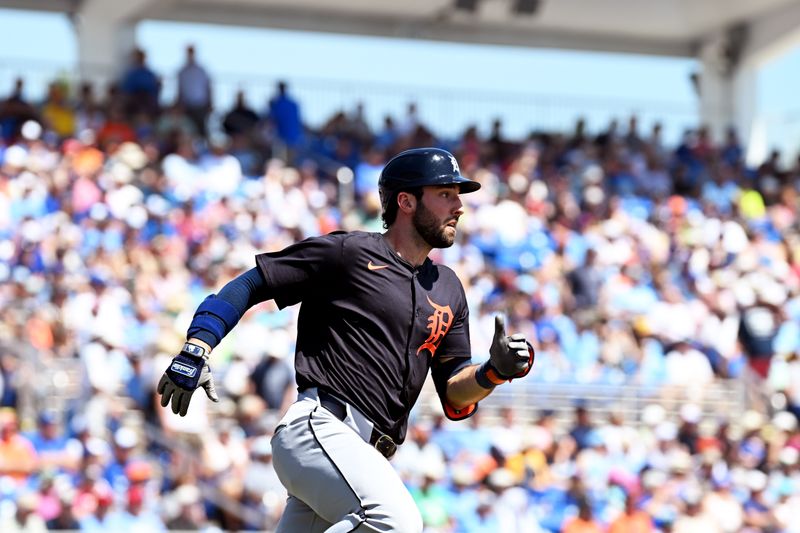 Mar 15, 2024; Dunedin, Florida, USA; Detroit Tigers centerfielder Matt Vierling (8) rounds first base on his way to a double in the first inning of a spring training game against the Toronto Blue Jays at TD Ballpark. Mandatory Credit: Jonathan Dyer-USA TODAY Sports