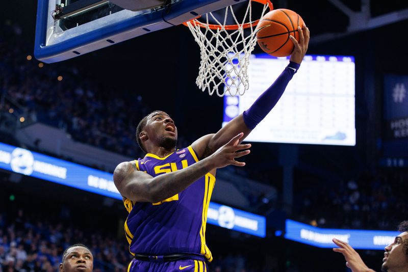 Jan 3, 2023; Lexington, Kentucky, USA; LSU Tigers forward KJ Williams (12) makes a layup to end the first half against the Kentucky Wildcats at Rupp Arena at Central Bank Center. Mandatory Credit: Jordan Prather-USA TODAY Sports