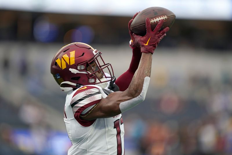 Washington Commanders wide receiver Terry McLaurin (17) warms up before an NFL football game against the Los Angeles Rams Sunday, Dec. 17, 2023, in Los Angeles. (AP Photo/Ryan Sun)