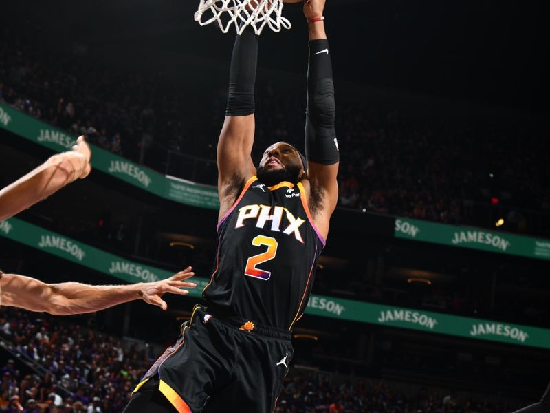 PHOENIX, AZ - APRIL 4: Josh Okogie #2 of the Phoenix Suns dunks the ball during the game against the Minnesota Timberwolves during Round 1 Game 4 of the 2024 NBA Playoffs on April 4, 2023 at Footprint Center in Phoenix, Arizona. NOTE TO USER: User expressly acknowledges and agrees that, by downloading and or using this photograph, user is consenting to the terms and conditions of the Getty Images License Agreement. Mandatory Copyright Notice: Copyright 2024 NBAE (Photo by Barry Gossage/NBAE via Getty Images)