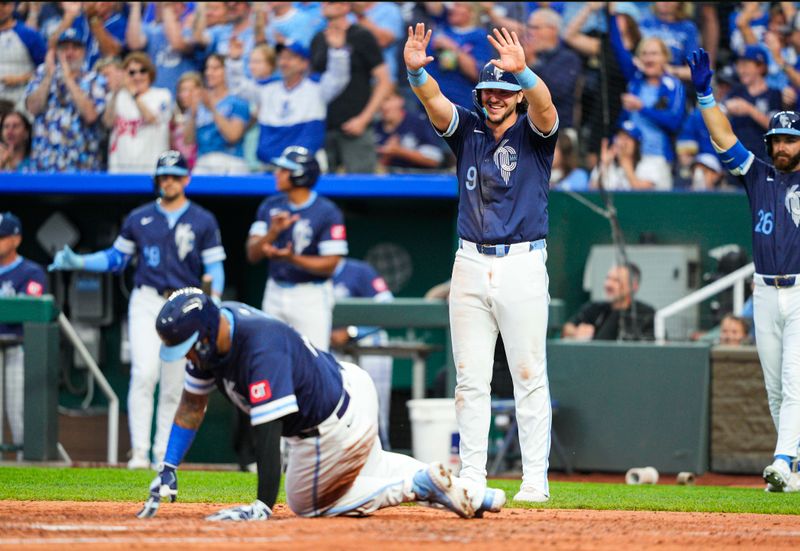 May 30, 2025; Kansas City, Missouri, USA; Kansas City Royals first baseman Vinnie Pasquantino (9) reacts as catcher Salvador Perez (13) scores during the third inning against the Detroit Tigers at Kauffman Stadium. Mandatory Credit: Jay Biggerstaff-Imagn Images