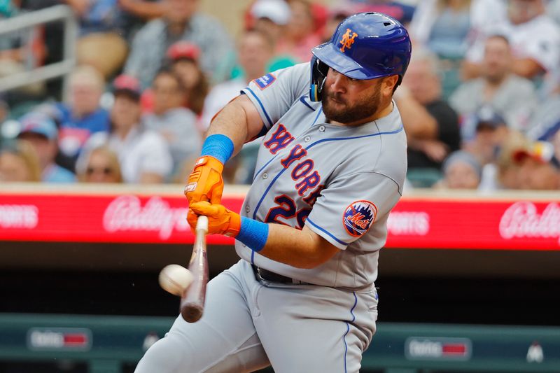 Sep 9, 2023; Minneapolis, Minnesota, USA; New York Mets right fielder DJ Stewart (29) hits a solo home run against the Minnesota Twins in the eighth inning at Target Field. Mandatory Credit: Bruce Kluckhohn-USA TODAY Sports