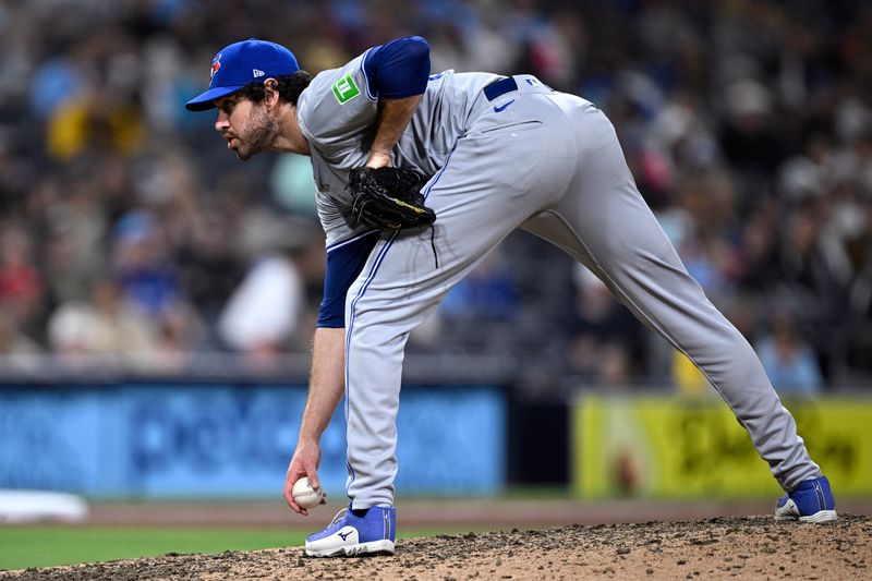 Apr 19, 2024; San Diego, California, USA; Toronto Blue Jays relief pitcher Jordan Romano (68) prepares to pitch against the San Diego Padres during the ninth inning at Petco Park. Mandatory Credit: Orlando Ramirez-USA TODAY Sports 