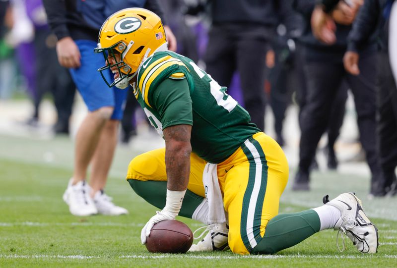 Green Bay Packers running back AJ Dillon (28) reacts after a run against the Minnesota Vikings during the second half of an NFL football game Sunday, Oct. 29, 2023, in Green Bay, Wis. (AP Photo/Jeffrey Phelps)