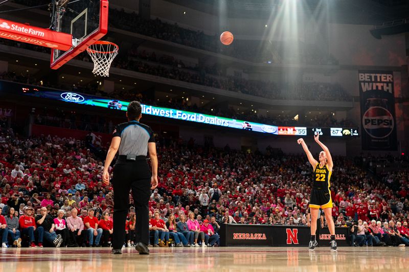 Feb 11, 2024; Lincoln, Nebraska, USA; Iowa Hawkeyes guard Caitlin Clark (22) shoots free throws against the Nebraska Cornhuskers during the third quarter at Pinnacle Bank Arena. Mandatory Credit: Dylan Widger-USA TODAY Sports