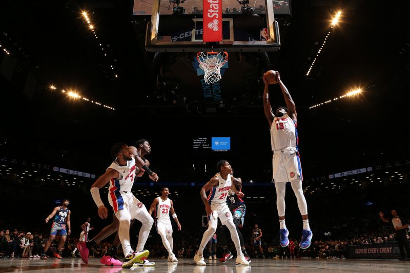 BROOKLYN, NY - APRIL 6: James Wiseman #13 of the Detroit Pistons grabs a rebound during the game against the Brooklyn Nets on April 6, 2024 at Barclays Center in Brooklyn, New York. NOTE TO USER: User expressly acknowledges and agrees that, by downloading and or using this Photograph, user is consenting to the terms and conditions of the Getty Images License Agreement. Mandatory Copyright Notice: Copyright 2024 NBAE (Photo by Nathaniel S. Butler/NBAE via Getty Images)