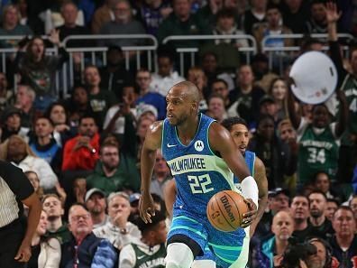 MILWAUKEE, WI - NOVEMBER 24: Khris Middleton #22 of the Milwaukee Bucks brings the ball up court against the Washington Wizards during the In-Season Tournament on November 24, 2023 at the Fiserv Forum Center in Milwaukee, Wisconsin. NOTE TO USER: User expressly acknowledges and agrees that, by downloading and or using this Photograph, user is consenting to the terms and conditions of the Getty Images License Agreement. Mandatory Copyright Notice: Copyright 2023 NBAE (Photo by Gary Dineen/NBAE via Getty Images).