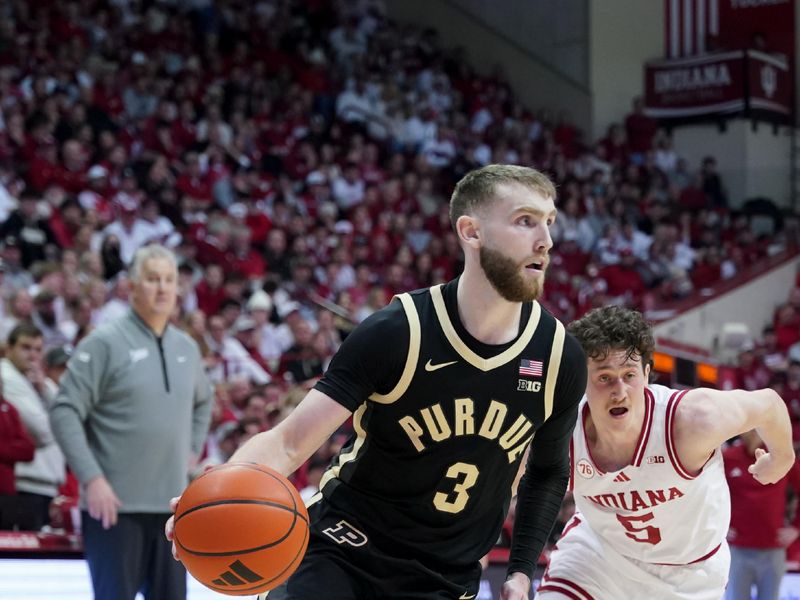 Jan 27, 2026; Bloomington, Indiana, USA; Purdue Boilermakers guard Braden Smith (3) dribbles the ball past Indiana Hoosiers guard Conor Enright (5) during the first half at Simon Skjodt Assembly Hall. Mandatory Credit: Robert Goddin-Imagn Images